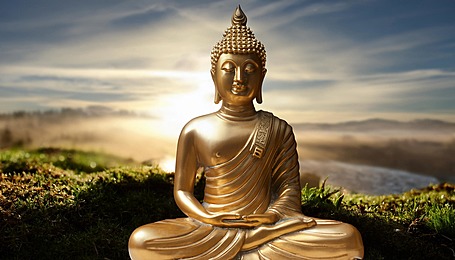 Golden buddha statue in nature