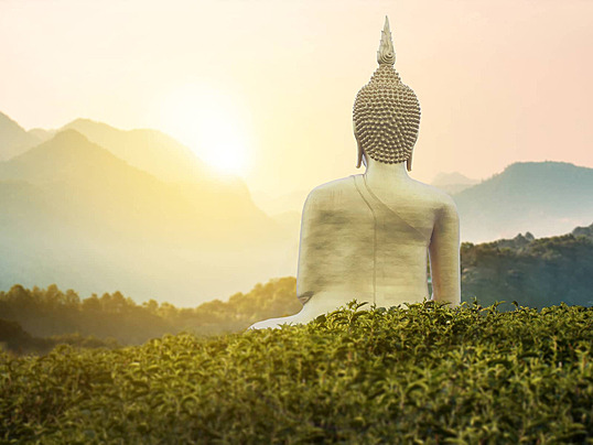 Pngtree gold buddha statue on mountain with nature scenery photo image